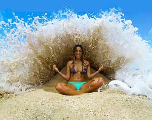 Carefully-Shaped Sand Pile Behind Her